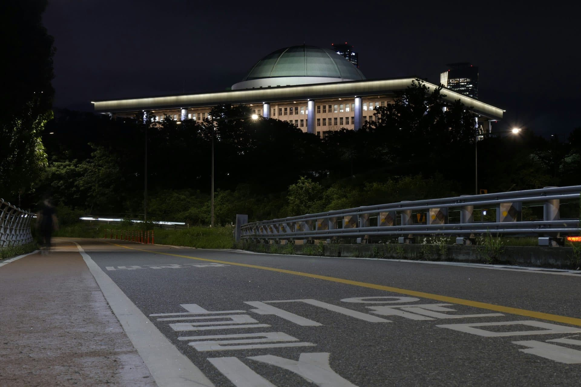 The illuminated National Assembly building in Seoul at night